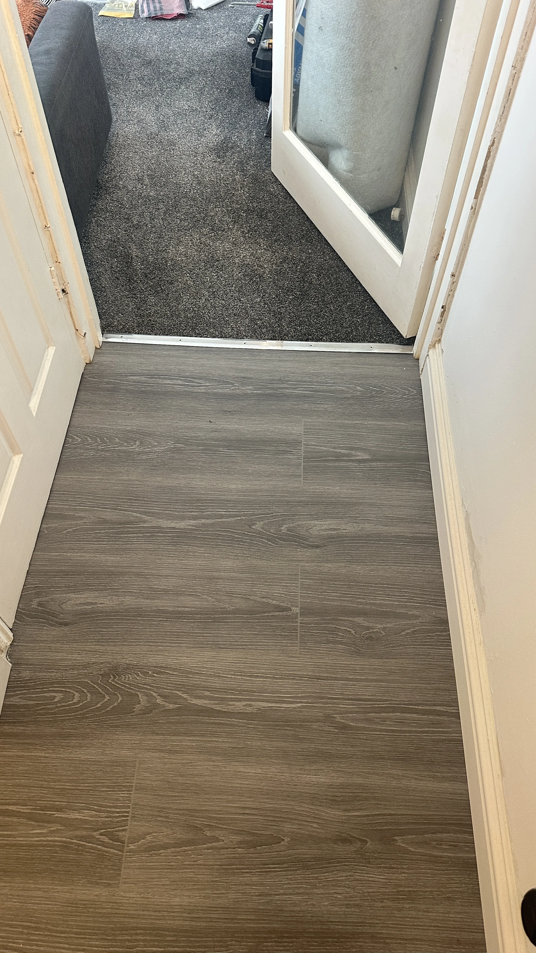 Flooring Installation hero image in Oxfordshire - a bathroom with a toilet and a mirror